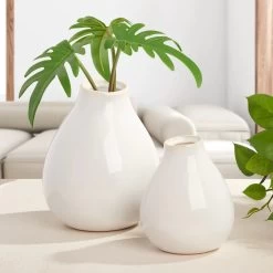 Bowen 7.25h" White Reactive Glaze Ceramic Bulb Vase -Chic Furniture Shop 27450 z 4 lg